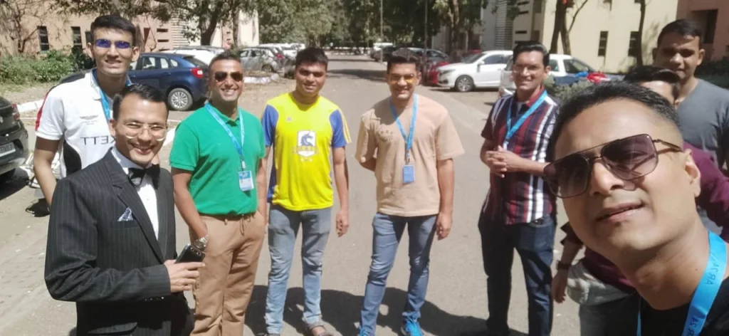 Hospitality team gathered outdoors during the Jamnagar deployment